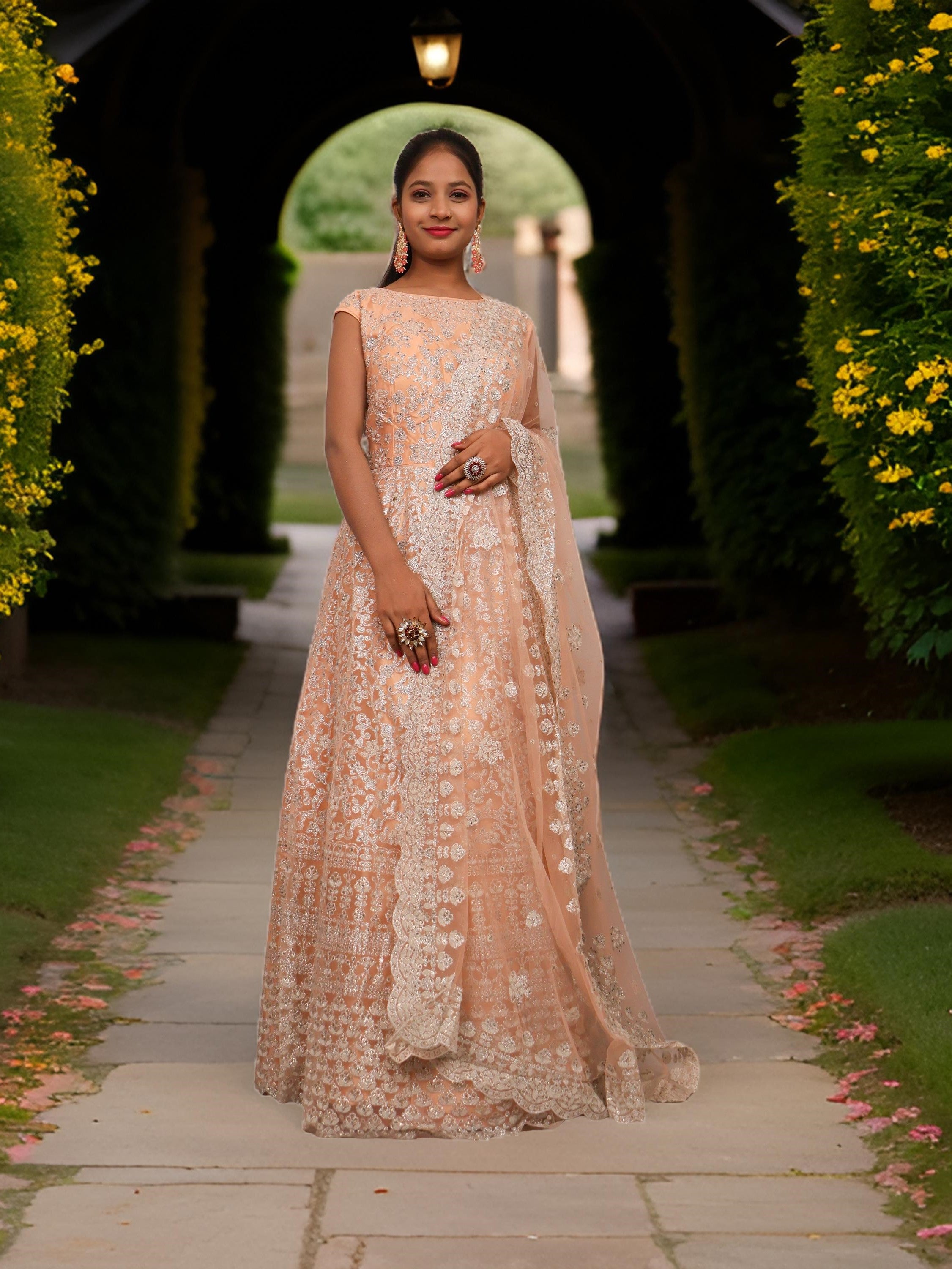 Shimmery and Shiny Beautiful Gown by Shreekama Peach Designer Gowns for Party Festival Wedding Occasion in Noida