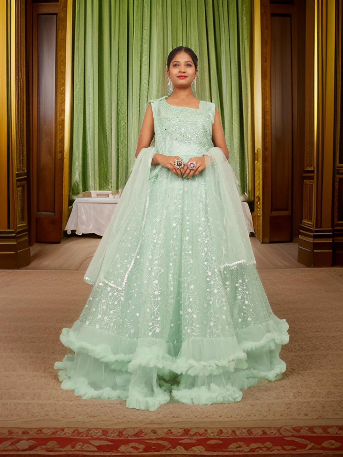 Gown with Mirror &amp; Cut Dana Work by Shreekama Pista Green Designer Gowns for Party Festival Wedding Occasion in Noida