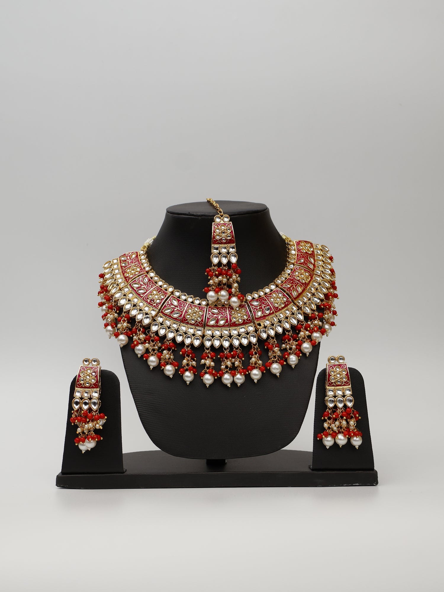 Red Meenakari Kundan &amp; Pearl Necklace Set with Earrings &amp; Mang Tikka. Fashion Jewelry for Party Festival Wedding Occasion in Noida