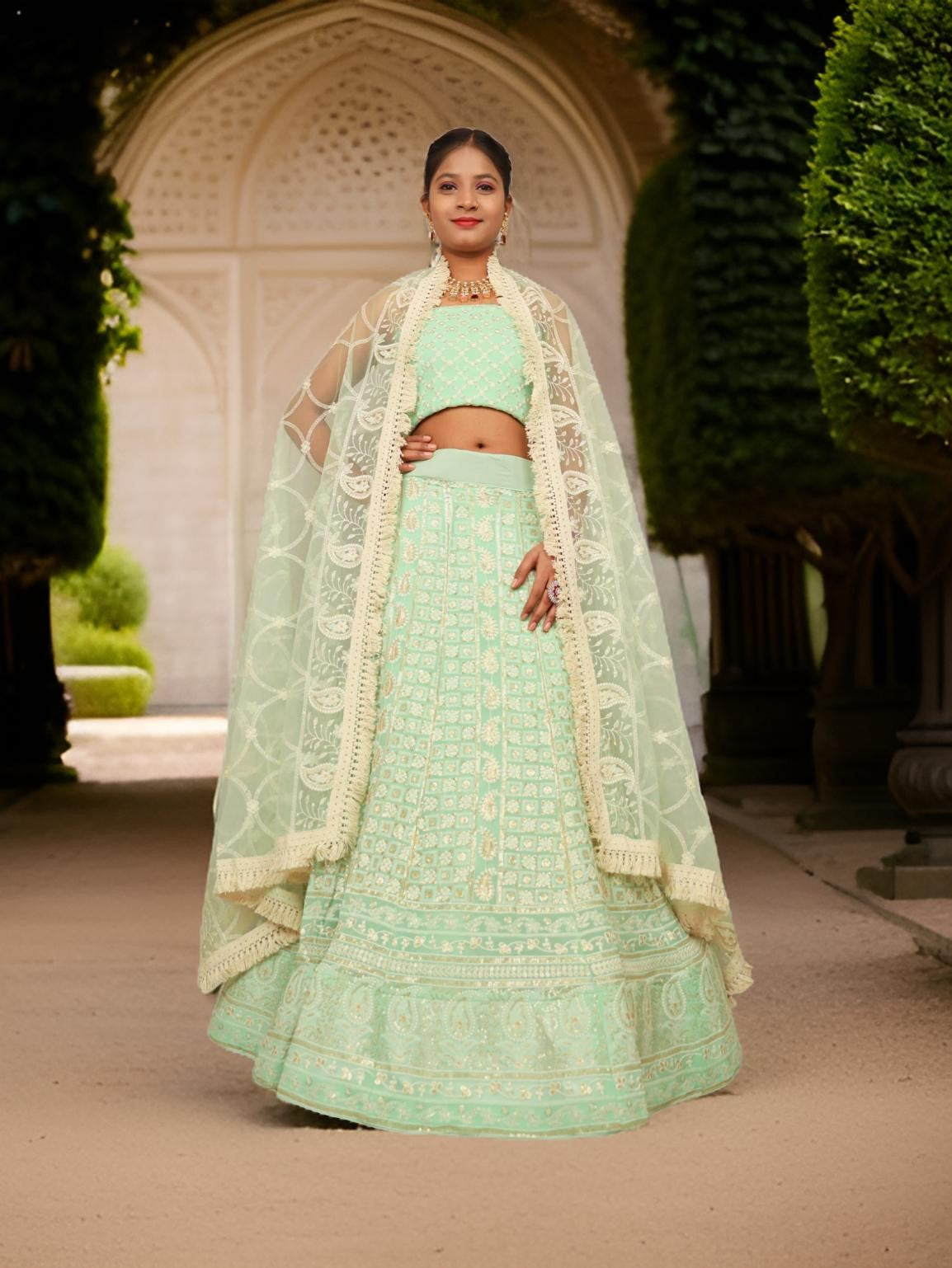 Semi-Stitched Lehenga with Embroidery &amp; Golden Sequin work by Shreekama D. Pista Green Semi-Stitched Lehenga for Party Festival Wedding Occasion in Noida