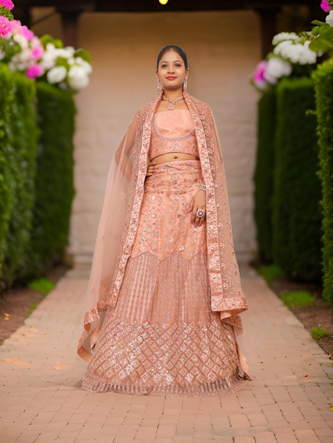 Semi-Stitched Lehenga with Soft Net Fabric &amp; Zari Thread Work by Shreekama Peach Semi-Stitched Lehenga for Party Festival Wedding Occasion in Noida