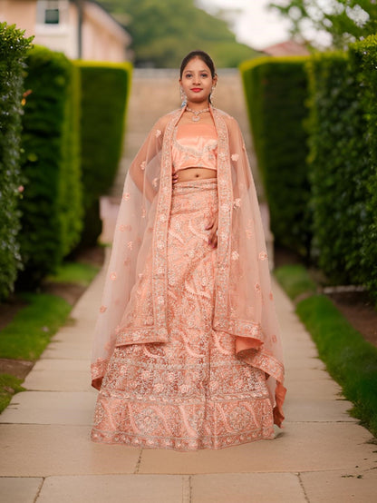 Semi-Stitched Lehenga with American Diamond &amp; Zari Thread Work by Shreekama Peach Semi-Stitched Lehenga for Party Festival Wedding Occasion in Noida